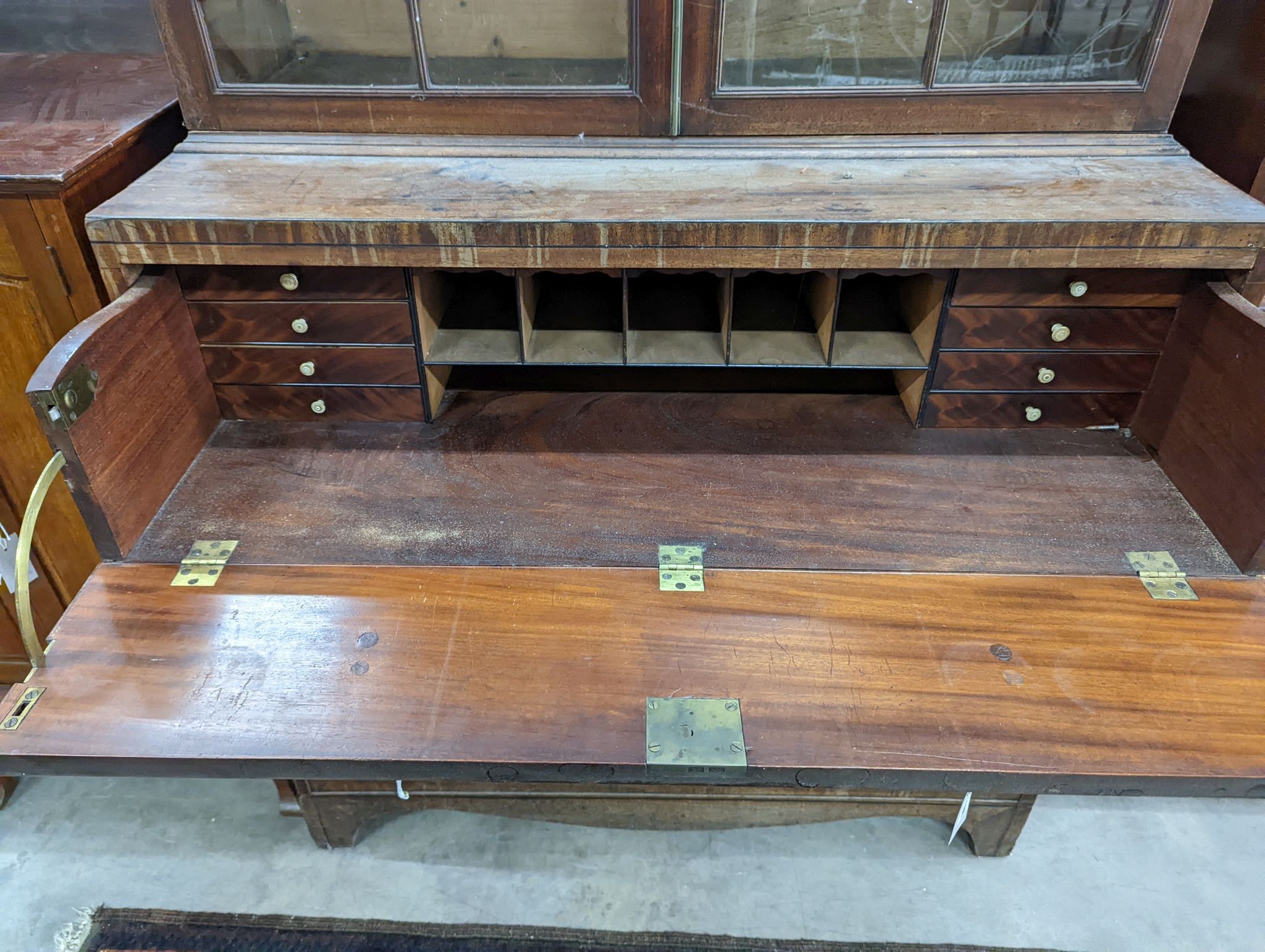 A Regency mahogany secretaire bookcase, length 106cm, depth 52cm, height 232cm
